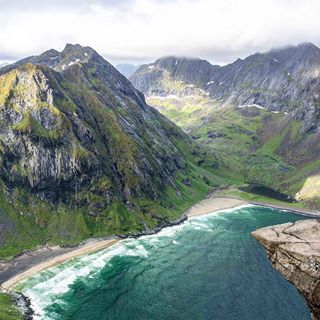 The hike up Ryten affords you stunning views of Kvalvika beach in the Lofoten Islands. I wanted to do this hike in the evening for some midnight sun photos. However, the weather was nothing but rain and heavy clouds. So on my last morning it was an early start out to make sure I had time to get there, hike, get back to hotel and shower before check out time. 
In Lofoten terms, it’s an easy hike as there isn’t an insanely steep hike up. However, all that rain made the trail one massive mud bath. It was a slip and slide that made it difficult. But once you got to the top with this view, completely worth it. And Lofoten’s parting gift to me...a bit of sun! For 3 glorious hours the sun came out with blue skies. But then the grey and rain returned as I headed for the ferry. 
It was an unforgettable time on the islands. I hope I can go back one day to explore further.
#ryten #kvalvika #kvalvikabeach #beaches #lofotenislands #visitlofoten #lofoten #explorenorway #hikingtrail #onthetrail #hikingadventure #wildernessculture #optoutside #neverstopexploring #keepitwild #freshairandfreedom #ourplanetdaily #roamtheplanet #nature_perfection #landscape_capture #landscape_love #worldtravelpics #shetravels #womenwhoexplore #greatoutdoors #suitcasetravels #traveltheworld